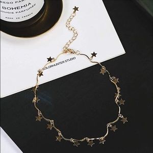 Gold star choker necklace